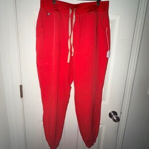 Figs Women's High Waisted Zamora Jogger Scrub Pants in Neon Red